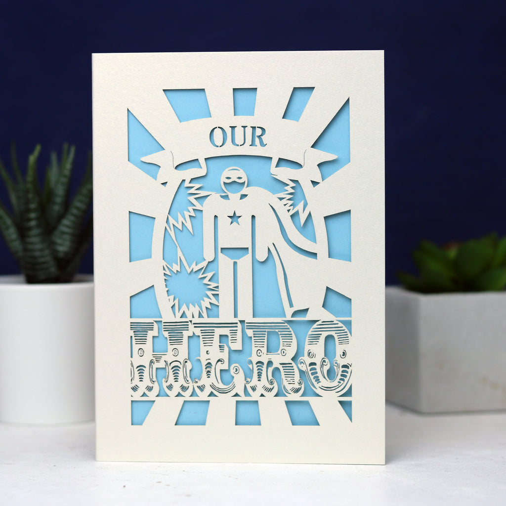 A cut out UK Father's Day card featuring the words "Our Hero"