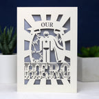 A paper cut UK Father's Day card featuring the words "Our Hero"