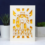 A paper cut UK Father's Day card featuring the words "Our Hero"
