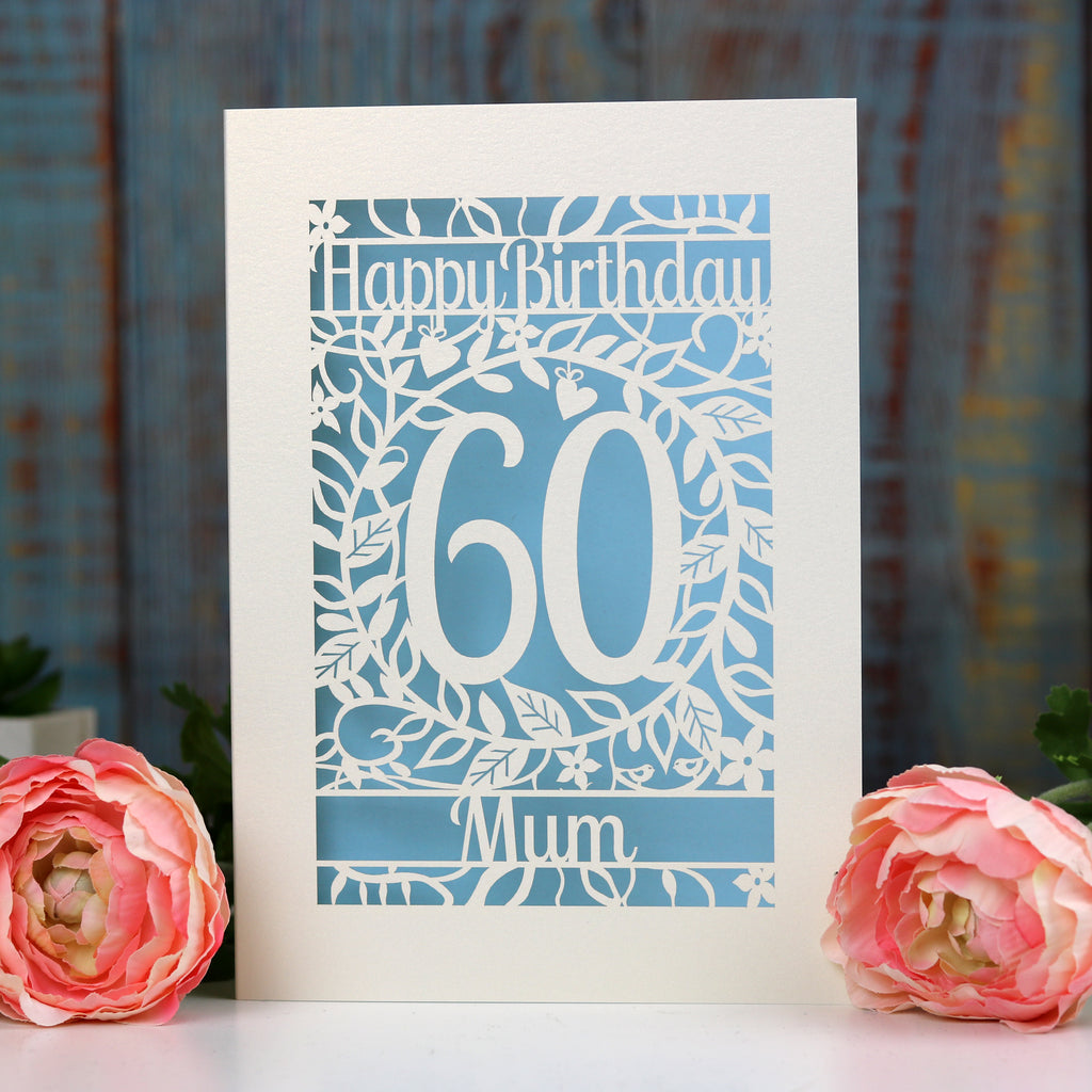 A laser cut floral Happy Birthday Card with an age and a name on it
