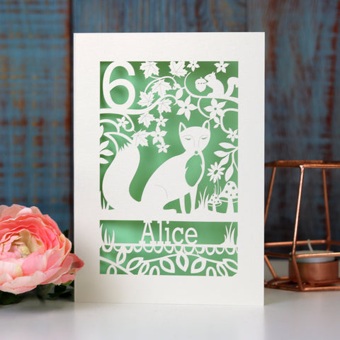 Laser cut fox birthday card with a light green paper insert. Card has the name Amelia at the bottom, with a fox in the centre and an age in the top left.  - A5 (large) / Light Green