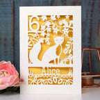 A birthday card for a child. There is a fox, surrounded by woodland details and a name and age. Card is laser cut. 