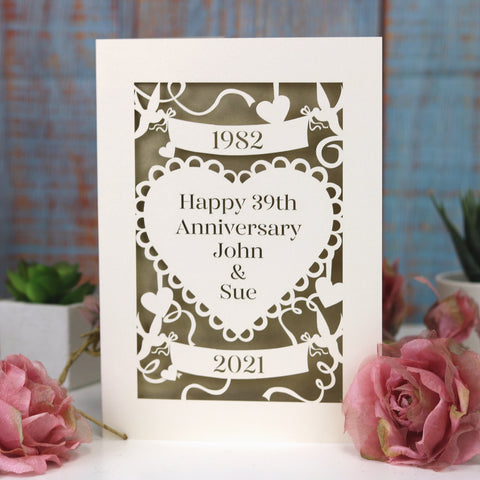 A golden wedding anniversary card laser cut from cream card and with a gold paper insert.  - 
