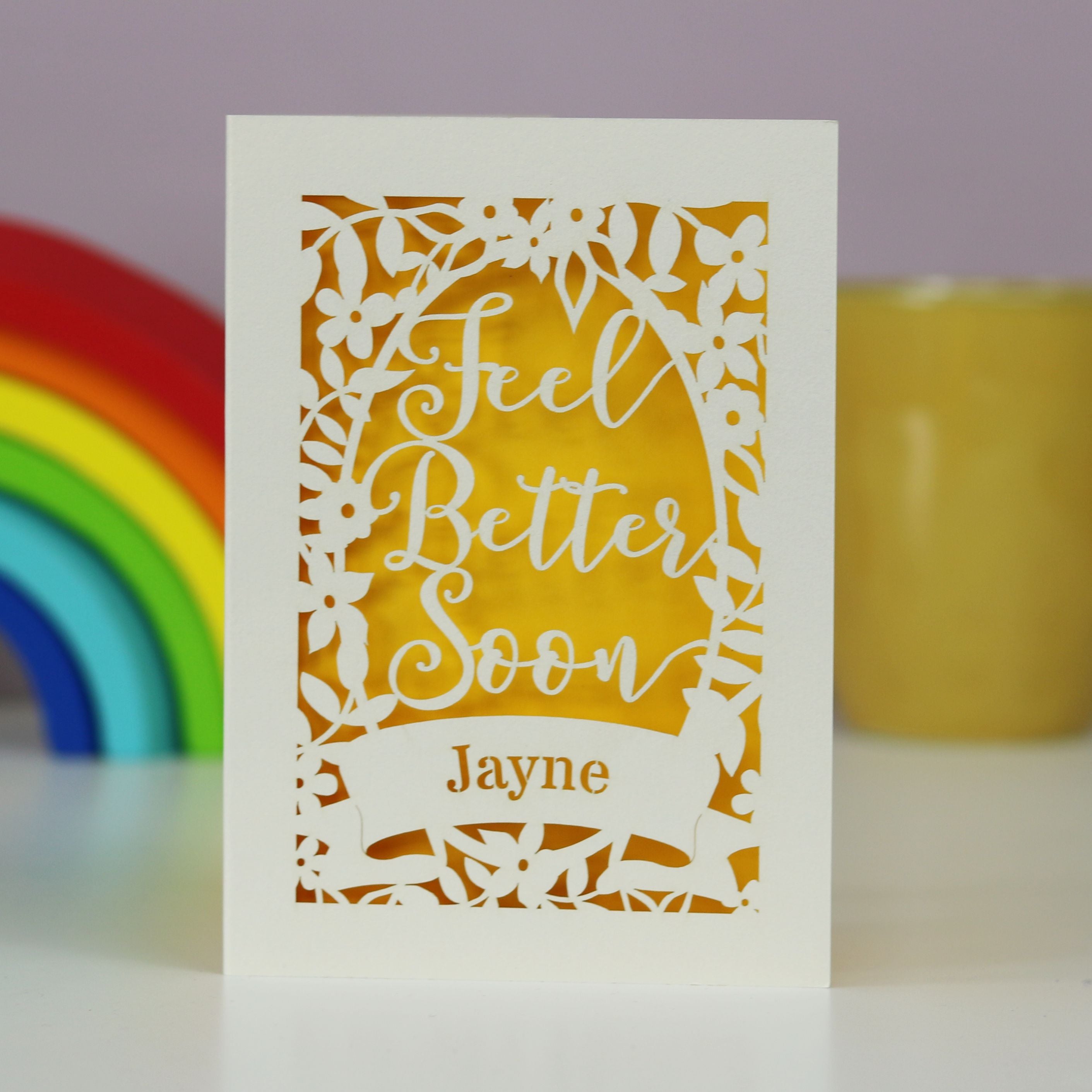 A paper cut out feel better soon card