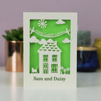 A unique personalised new home card with a house, cat, flowers, the words "home sweet home" and the recipient's name