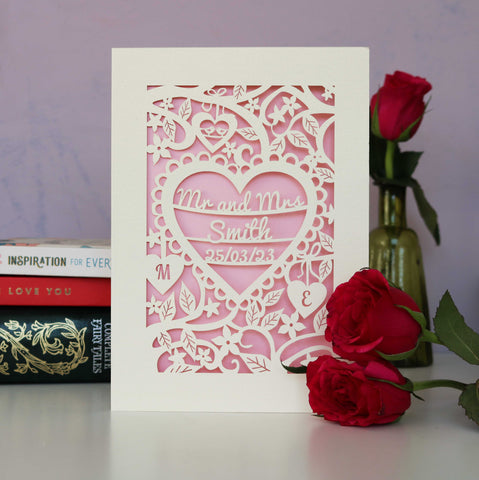 A wedding card personalised and laser cut. Cut away card reveals a light pink paper insert. - A5 / Candy Pink