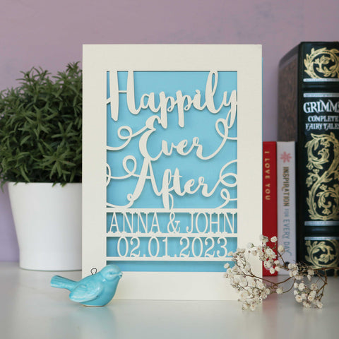 A card that says happily ever after, personalised with names and a wedding date.  - A6 (Small) / Light Blue