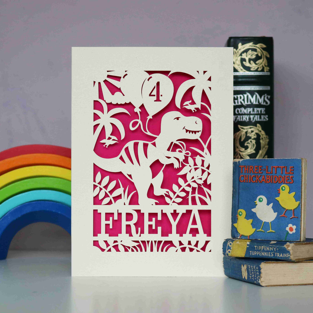A cream and pink dinosaur card for girl's birthday.