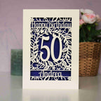 A personalised birthday card with an age and a name. Violet insert shows through the cut card.