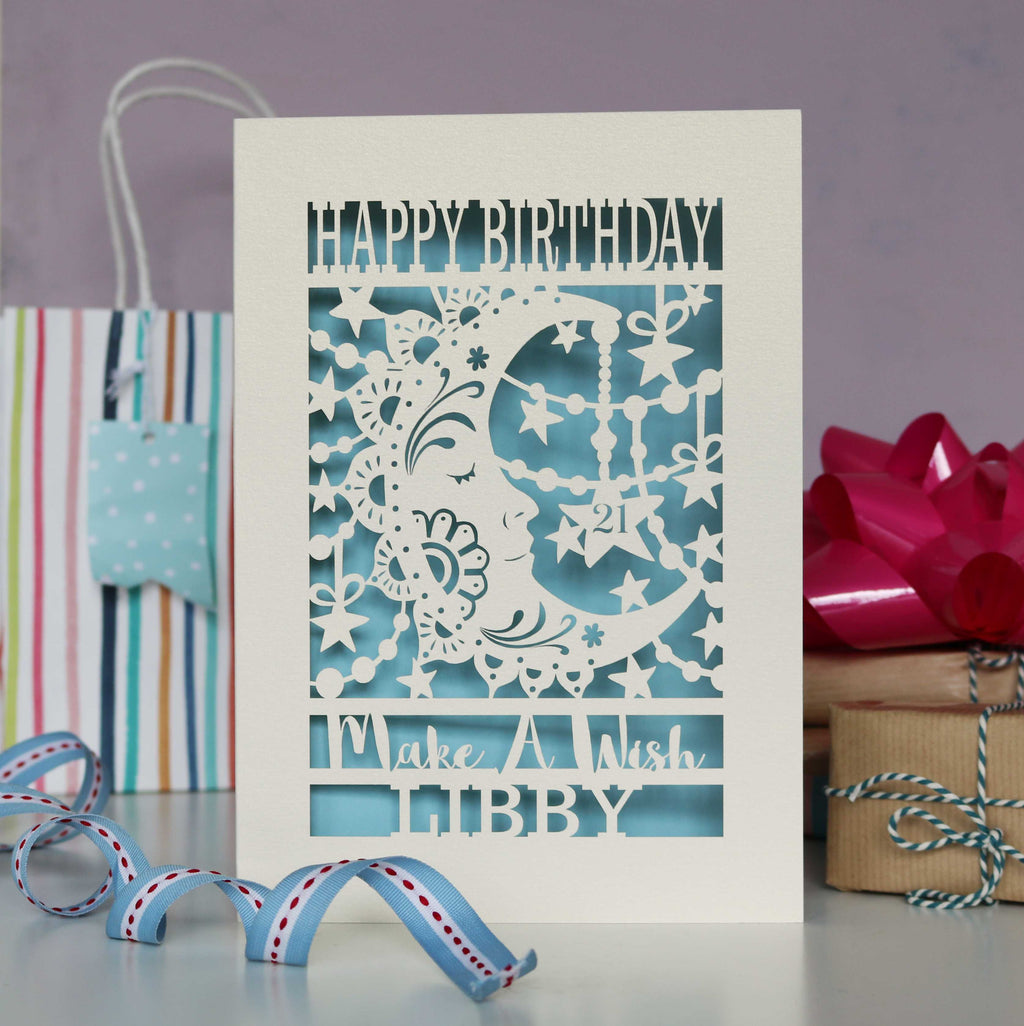 Personalised Moon Birthday card with decorative elements on a blue background