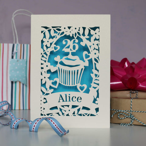 Cupcake birthday card, personalised with age and name. Laser cut from cream card and finished with a peacock blue insert paper. Ideal for a girly birthday or for anyone who likes cake. - A5 / Peacock Blue
