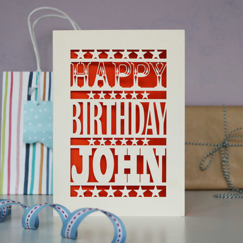 A cream birthday card laser cut to say happy birthday with a name underneath. - A5 / Orange
