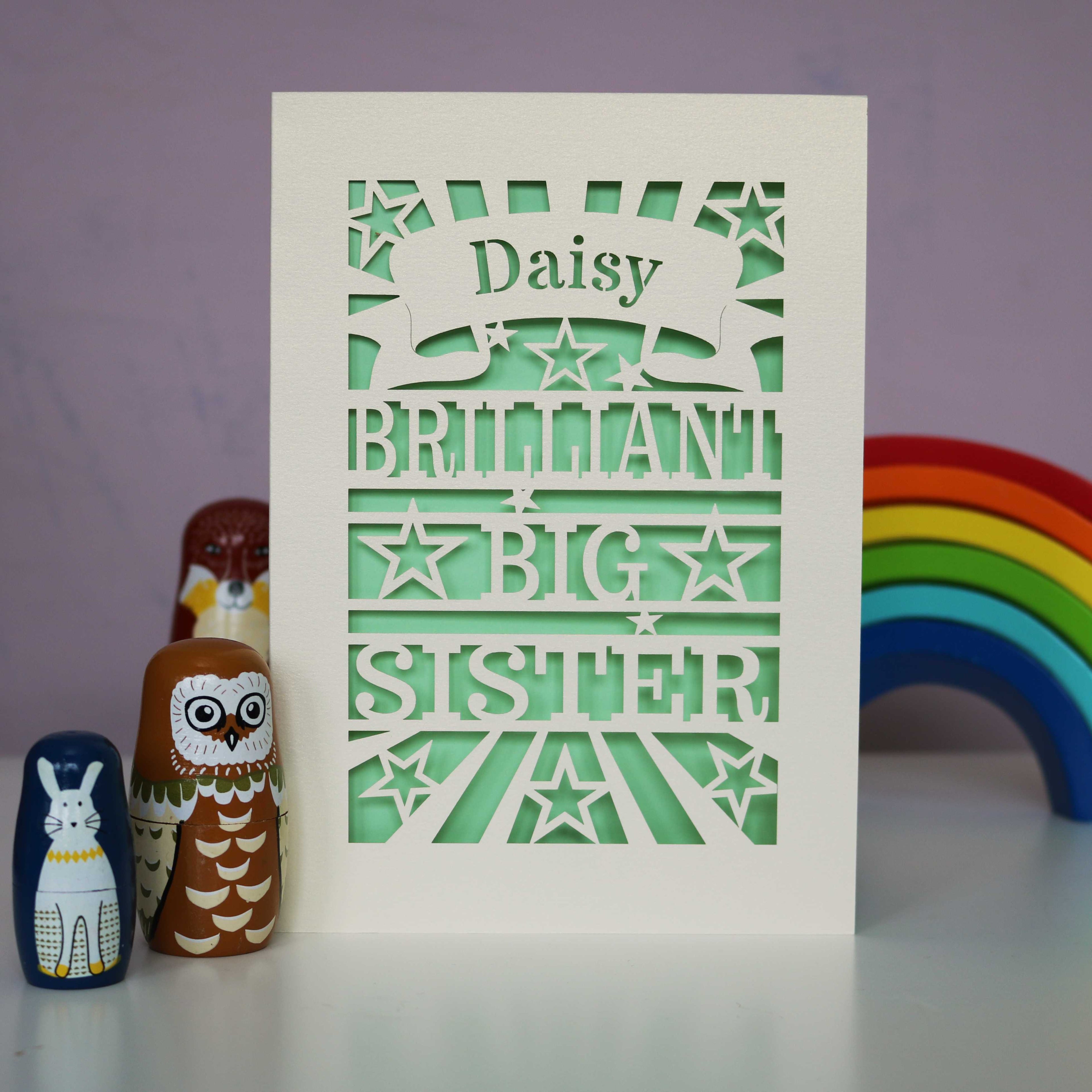 A laser cut personalised Big Sister card