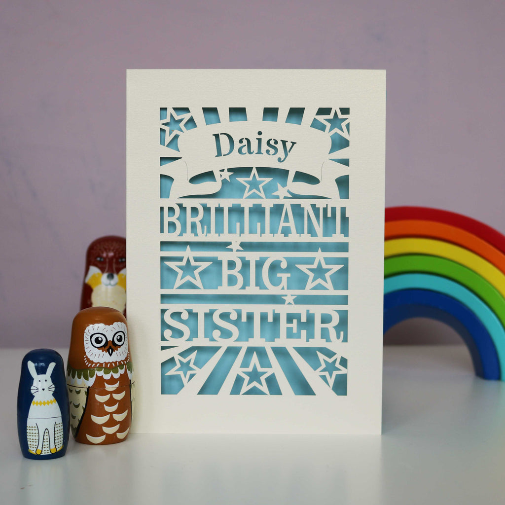 A laser cut personalised Big Sister card