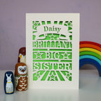 A laser cut personalised Big Sister card