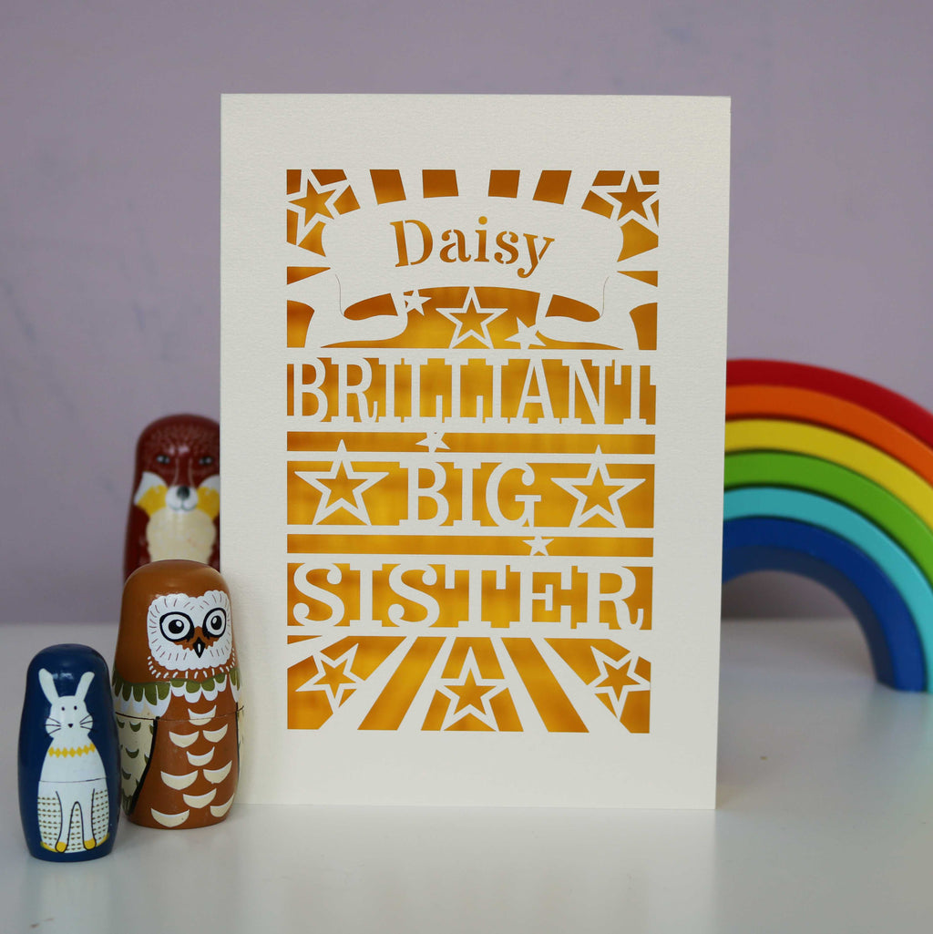 A laser cut personalised Big Sister card