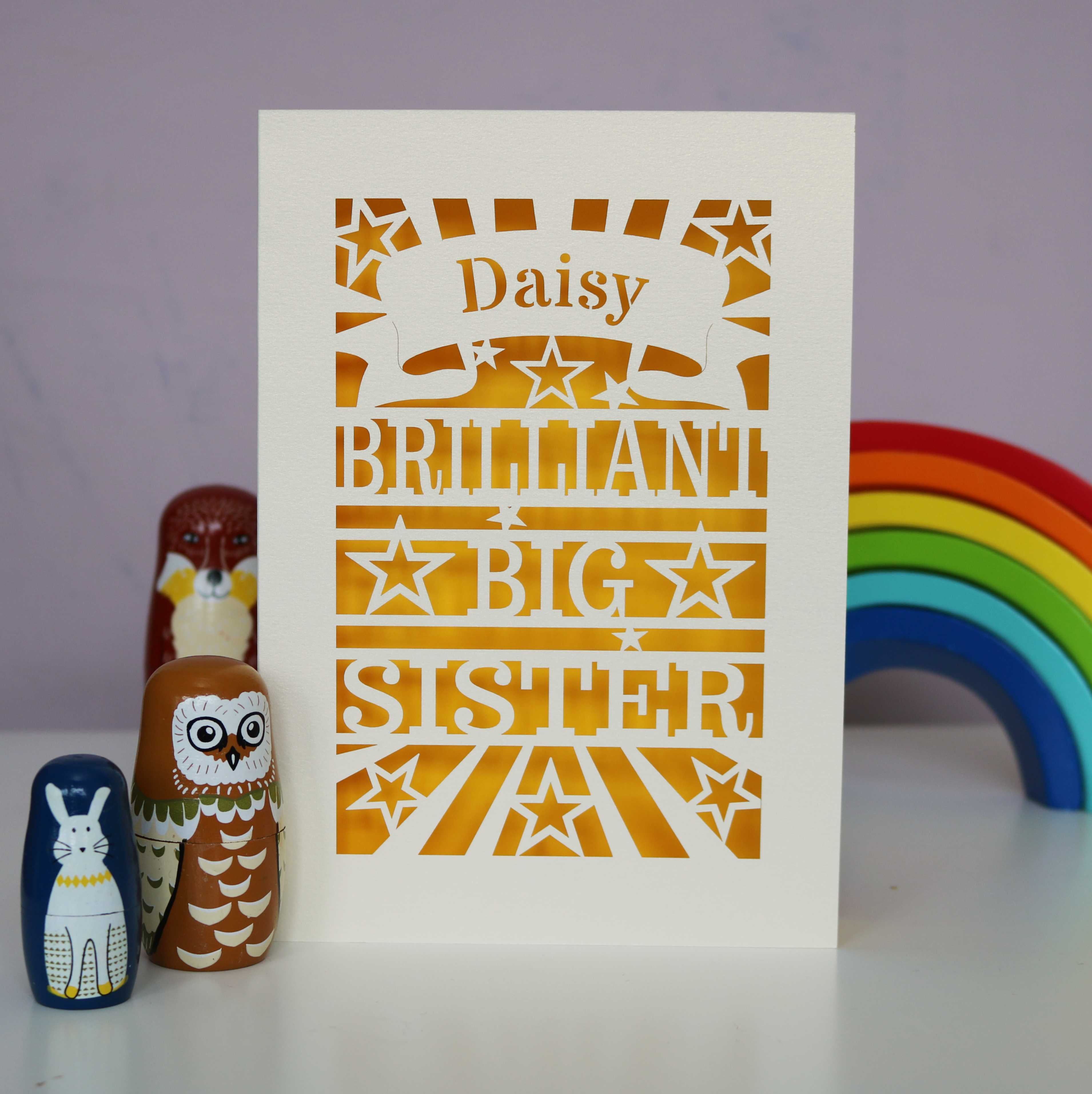 A laser cut personalised Big Sister card