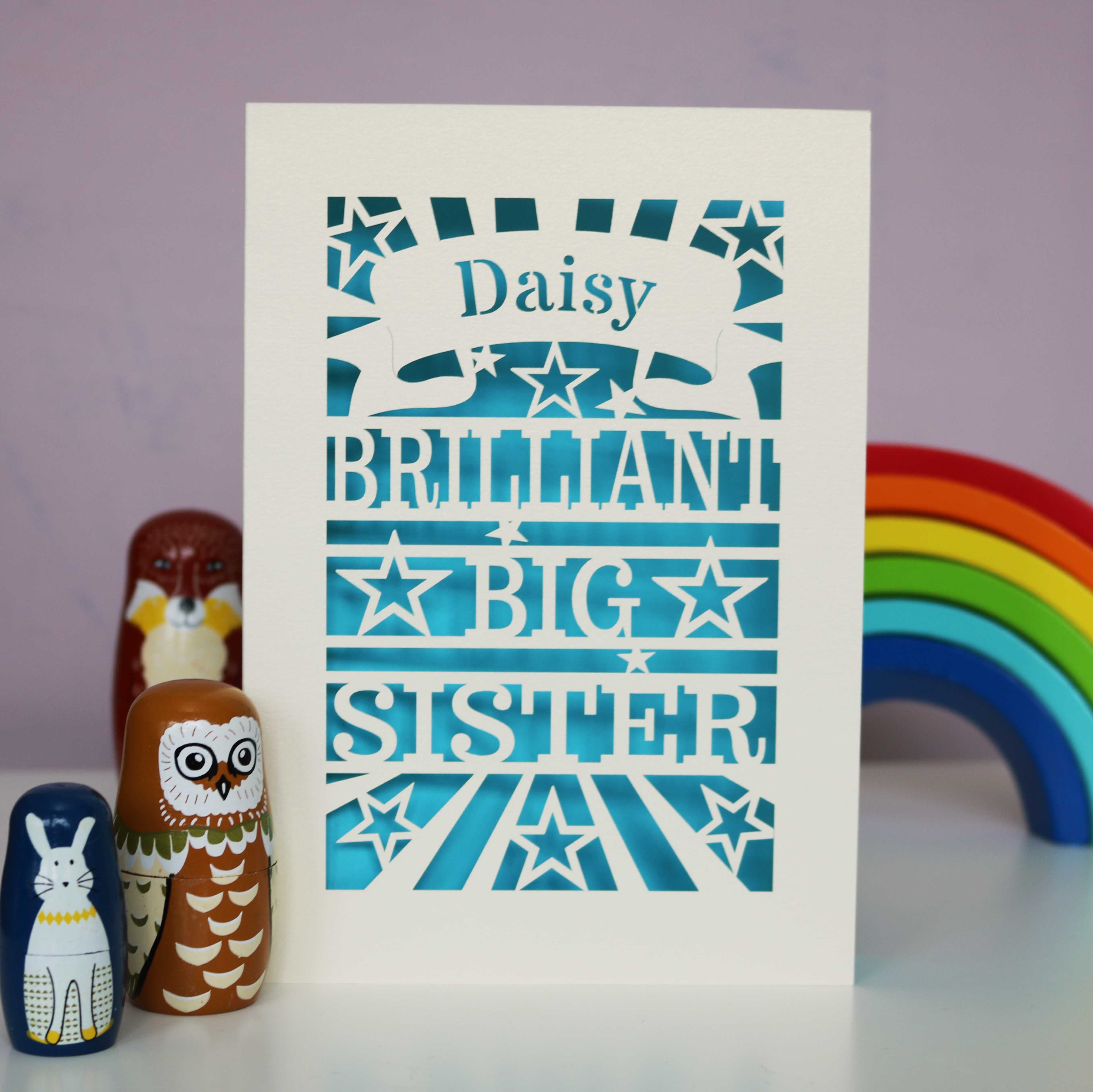 A laser cut personalised Big Sister card