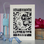 A cream and grey laser cut birthday card with moon design