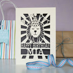 A cream and grey laser cut lion birthday card for kids