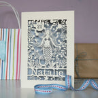 A cream and silver mermaid laser cut birthday card for girls.