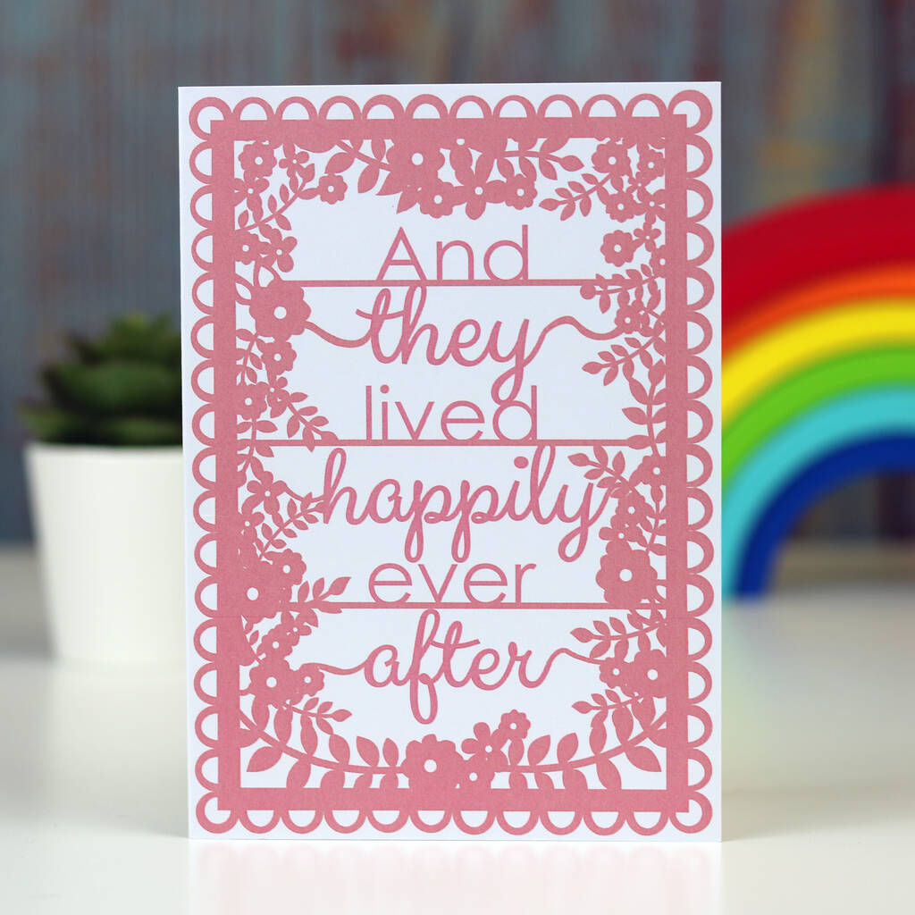 An engagement card that says "And they lived happily ever after"