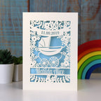 Papercut new baby cards, personalised with name and date of birth. Design is a Silvercross pram and flowers. 