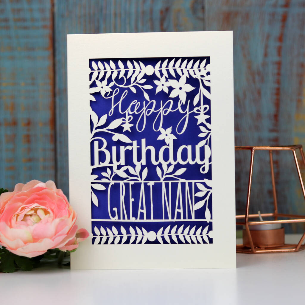 A laser cut personalised birthday card with a violet paper insert. 