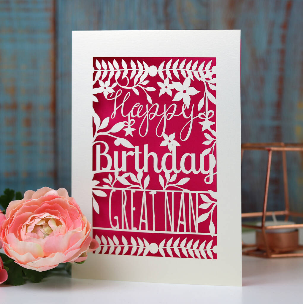 A personalised paper cut birthday card with a shocking pink paper insert. 