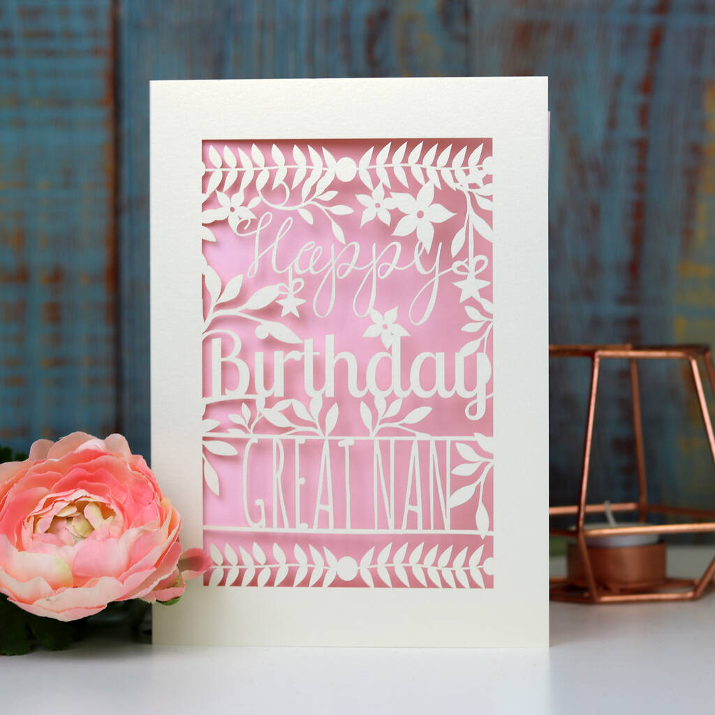A laser cut card for birthdays. Card says Happy Birthday Great Nan, with a candy pink paper insert. 