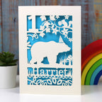 Bear birthday card laser cut from cream card with a peacock blue insert paper.  Personalise with a name and age.