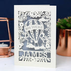 Bon Voyage card in cream with a silver background and personalised with the traveller's name.