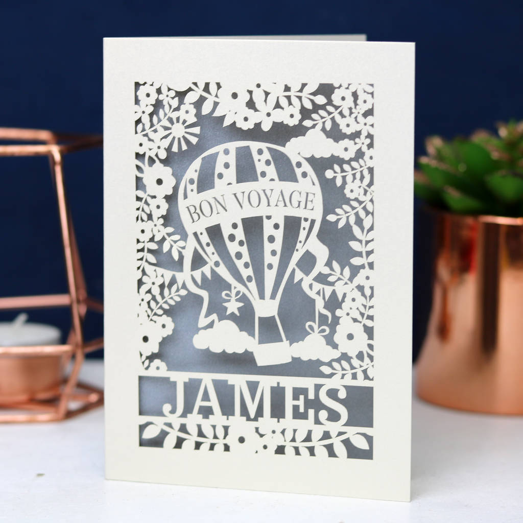 Bon Voyage card in cream with a silver background and personalised with the traveller's name.